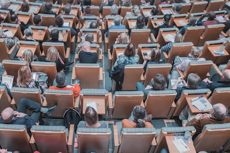 conference-people-sitting-chairs