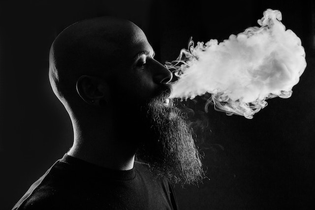 vape-man-smoke-exhale-black-white